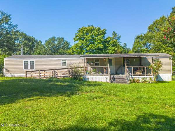 3.7 Acres of Residential Land with Home for Sale in McHenry, Mississippi