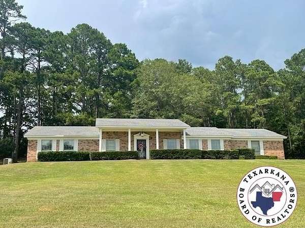 1.59 Acres of Residential Land with Home for Sale in Atlanta, Texas