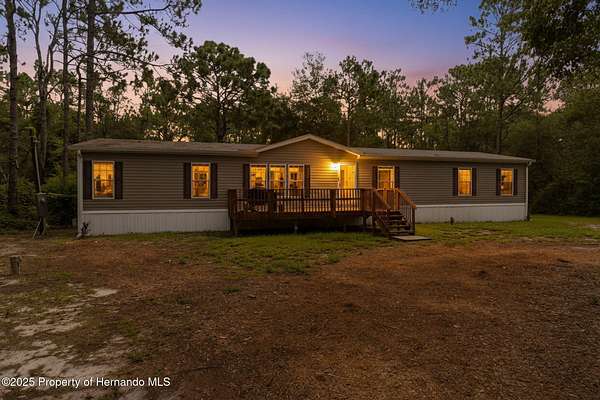 4 Acres of Residential Land with Home for Sale in Shady Hills, Florida