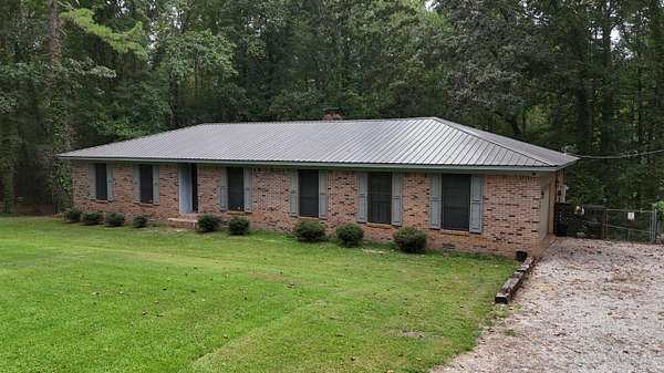 5.2 Acres of Residential Land with Home for Sale in Tiplersville, Mississippi