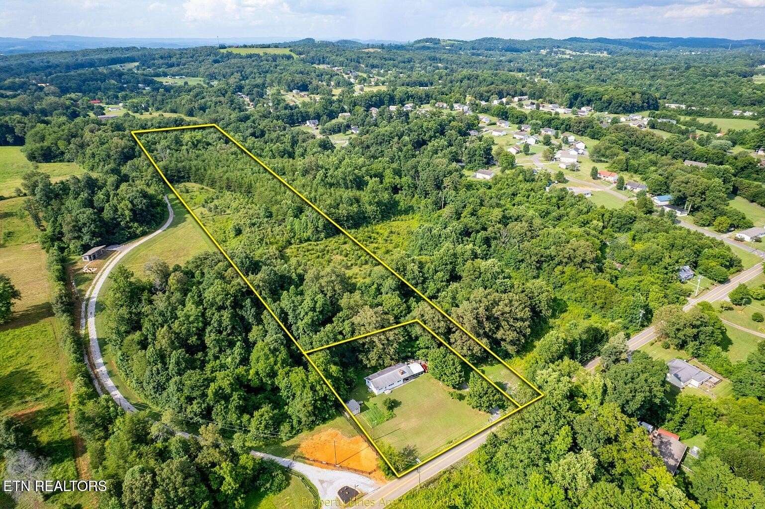 10.4 Acres of Agricultural Land for Sale in Strawberry Plains, Tennessee