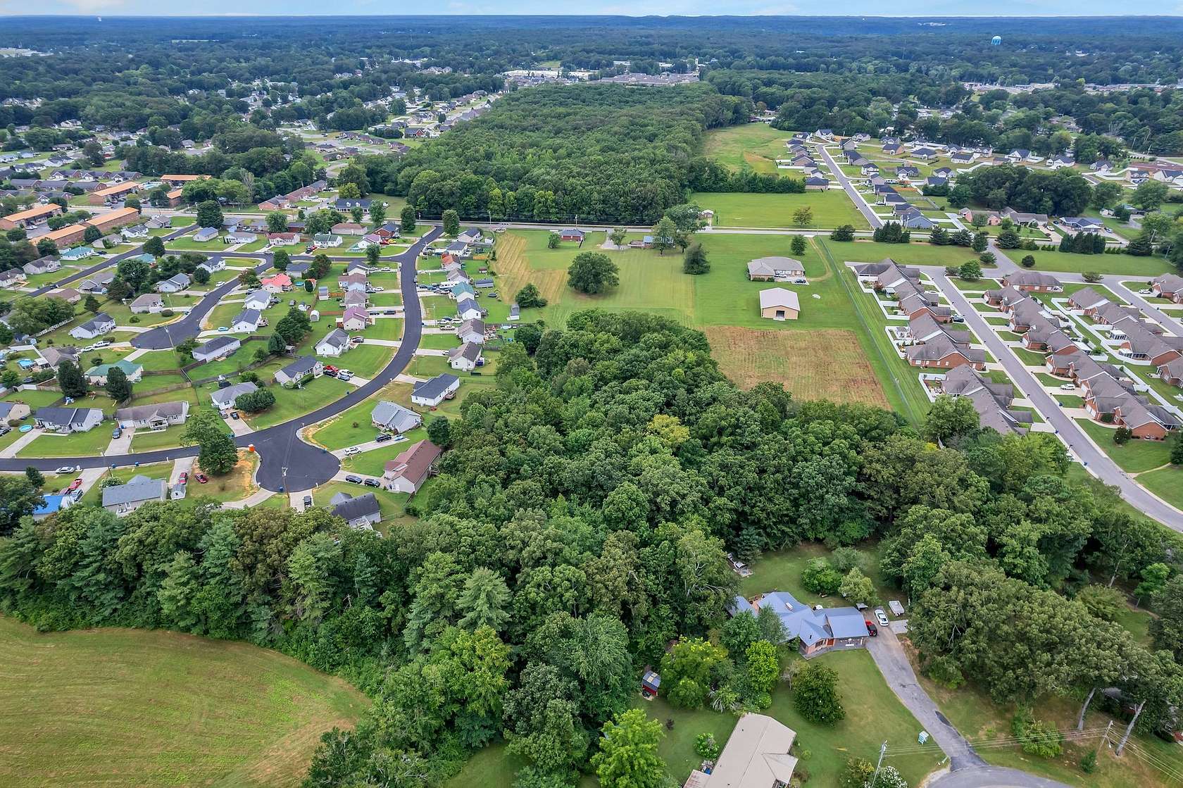 4.5 Acres of Residential Land with Home for Sale in Manchester, Tennessee