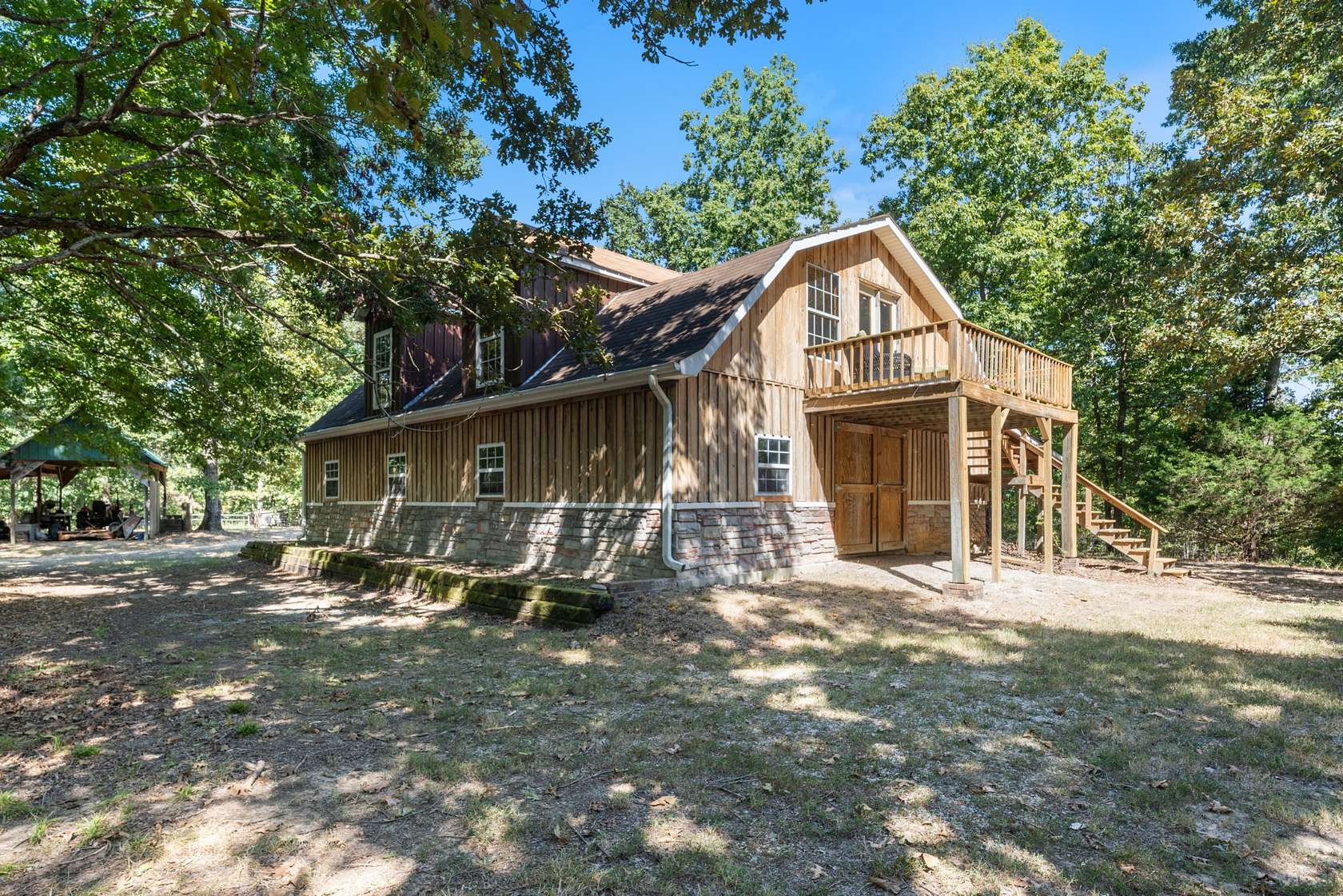 16.3 Acres of Land with Home for Sale in Nunnelly, Tennessee