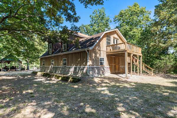 16.3 Acres of Land with Home for Sale in Nunnelly, Tennessee