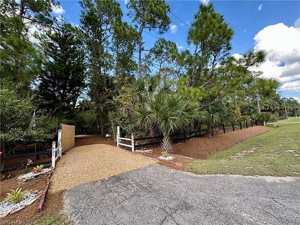 2.27 Acres of Residential Land with Home for Sale in Naples, Florida