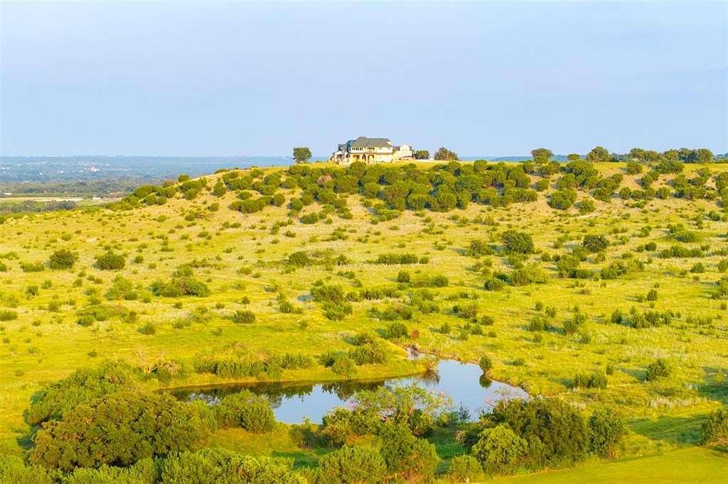 190 Acres of Agricultural Land with Home for Sale in Meridian, Texas