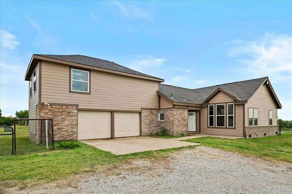 5 Acres of Residential Land with Home for Sale in Greenville, Texas