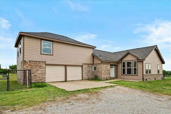 5 Acres of Residential Land with Home for Sale in Greenville, Texas