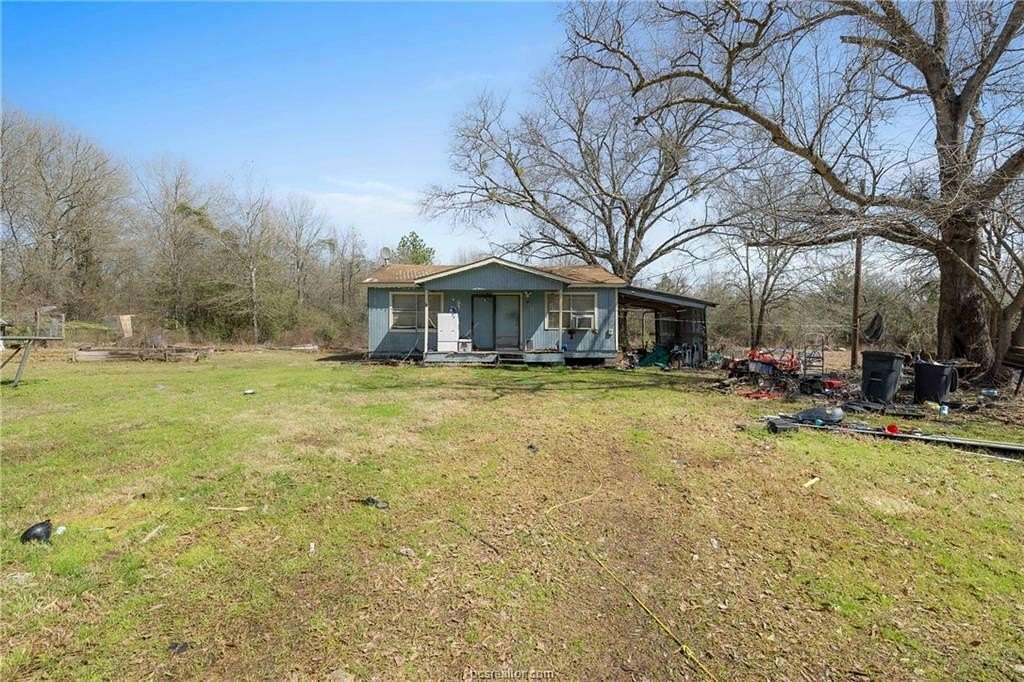 9 Acres of Residential Land with Home for Sale in Bedias, Texas