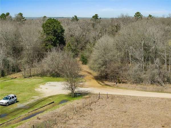9 Acres of Land with Home for Sale in Bedias, Texas