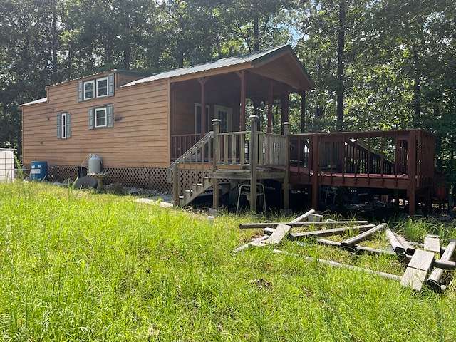 80 Acres of Recreational Land with Home for Sale in Yellville, Arkansas