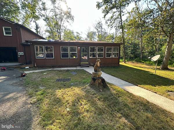 5.63 Acres of Residential Land with Home for Sale in Hedgesville, West Virginia