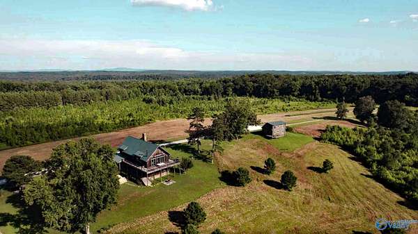 910 Acres of Recreational Land with Home for Sale in Pell City, Alabama