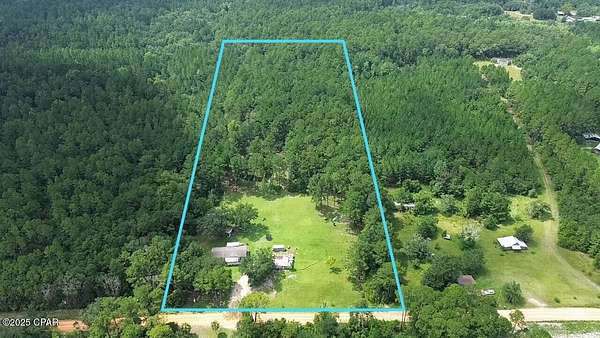 10 Acres of Residential Land with Home for Sale in Vernon, Florida