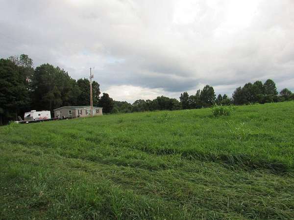 15.4 Acres of Land with Home for Sale in Columbia, Kentucky
