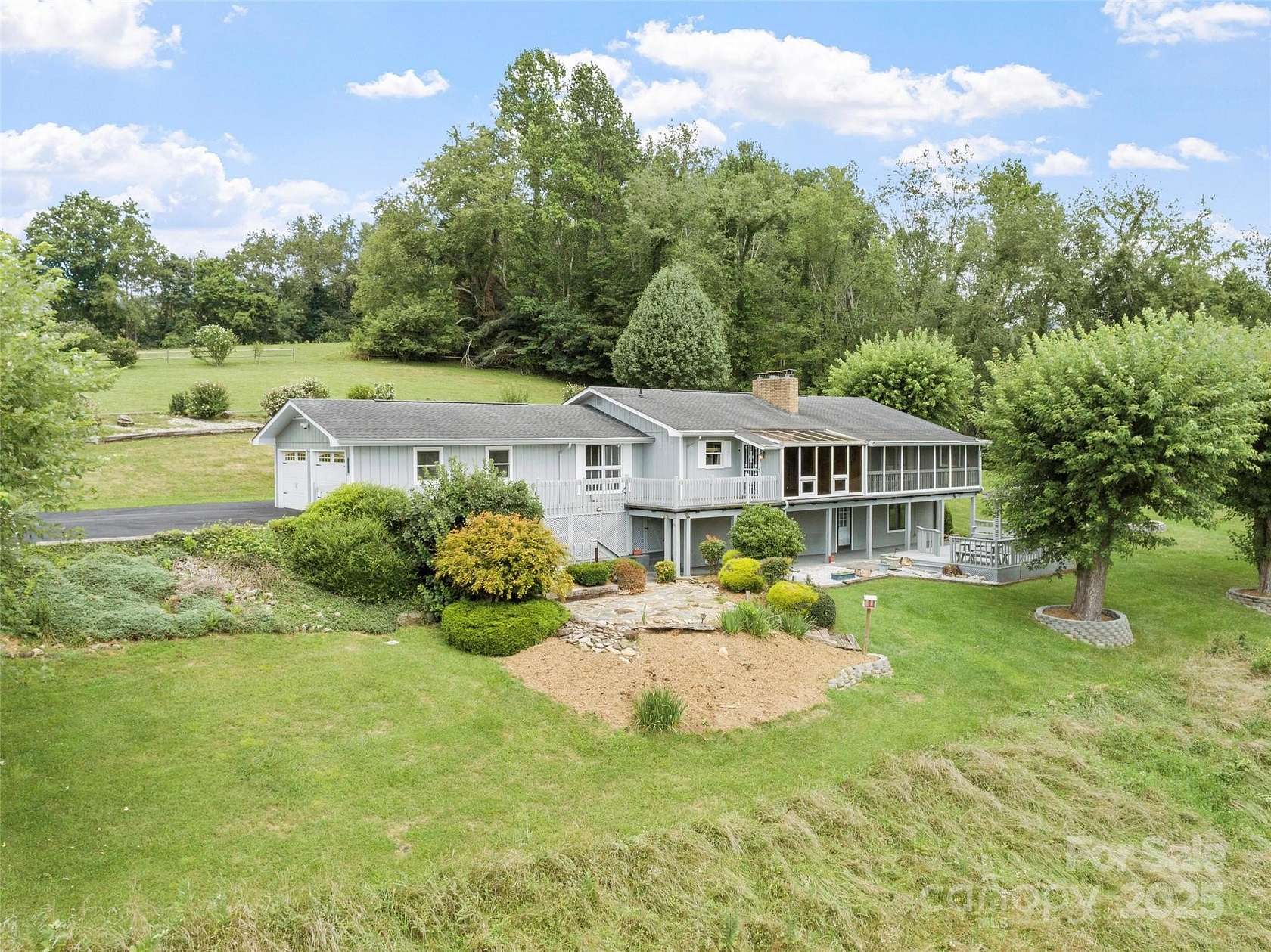 3 Acres of Residential Land with Home for Sale in Burnsville, North Carolina