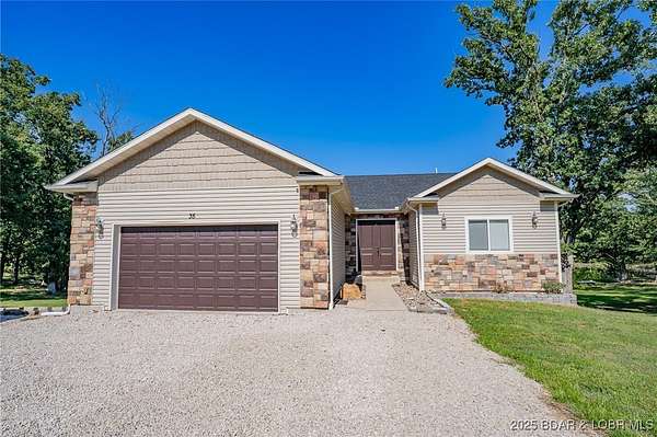 12.5 Acres of Recreational Land with Home for Sale in Kaiser, Missouri