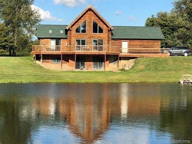 60.3 Acres of Land with Home for Sale in Forest Township, Michigan