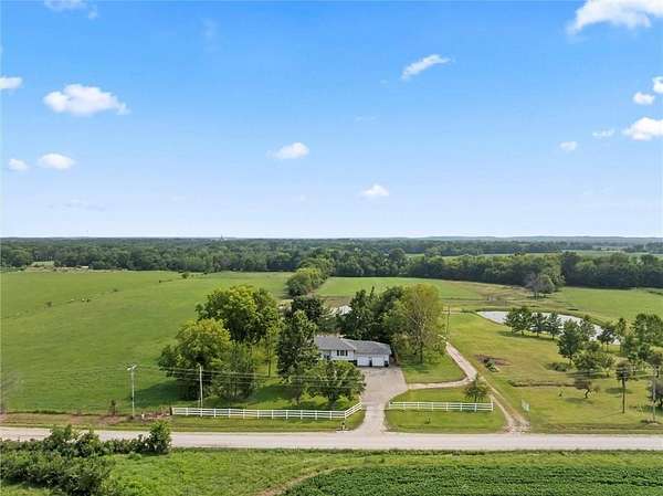 30 Acres of Land with Home for Sale in Harrisonville, Missouri