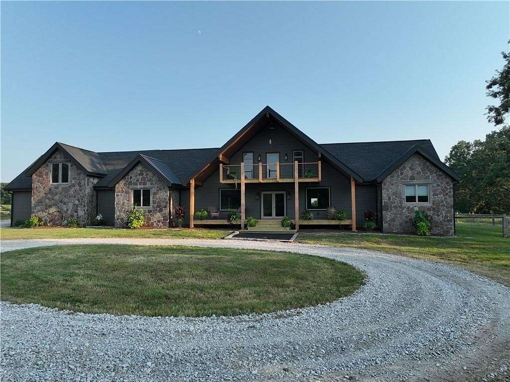 11.6 Acres of Recreational Land with Home for Sale in Gravette, Arkansas