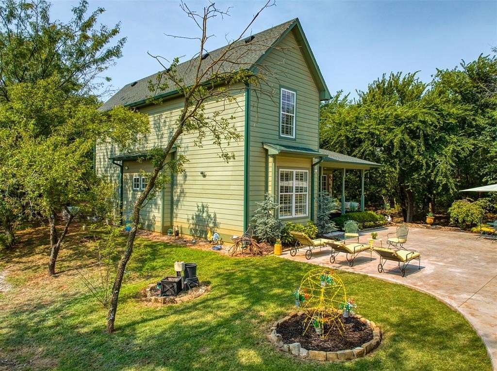 5.65 Acres of Residential Land with Home for Sale in Yukon, Oklahoma