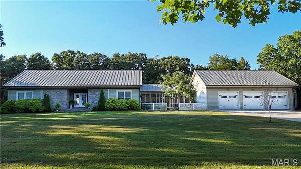 3.84 Acres of Residential Land with Home for Sale in De Soto, Missouri