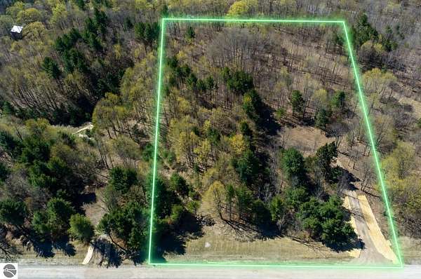5 Acres of Residential Land for Sale in Cedar, Michigan