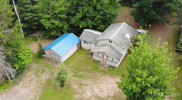 40 Acres of Recreational Land with Home for Sale in Trout Creek, Michigan