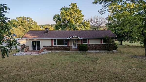 3.65 Acres of Residential Land with Home for Sale in Bradleyville, Missouri