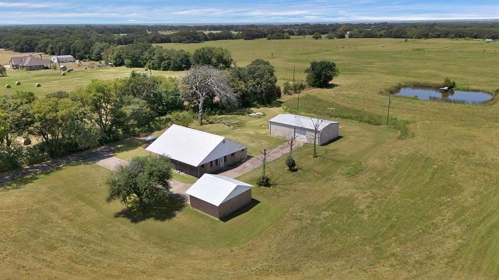 26.6 Acres of Agricultural Land with Home for Sale in Scurry, Texas