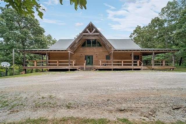 54.9 Acres of Recreational Land with Home for Auction in Chelsea, Oklahoma