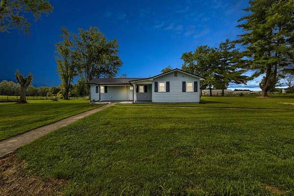 7.47 Acres of Land with Home for Sale in Salt Lick, Kentucky