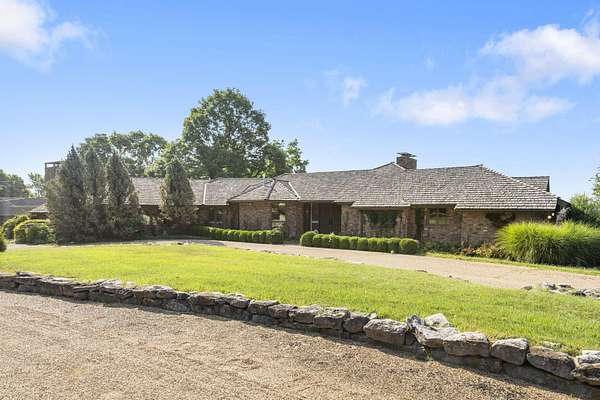 2.25 Acres of Residential Land with Home for Sale in Springfield, Missouri