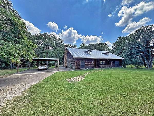 53.7 Acres of Agricultural Land with Home for Sale in Athens, Texas