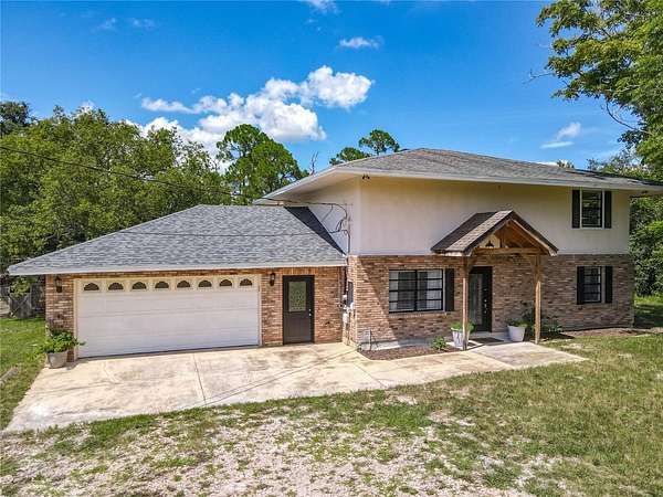 3.64 Acres of Residential Land with Home for Sale in Osteen, Florida