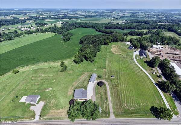 3.9 Acres of Residential Land with Home for Auction in Navarre, Ohio