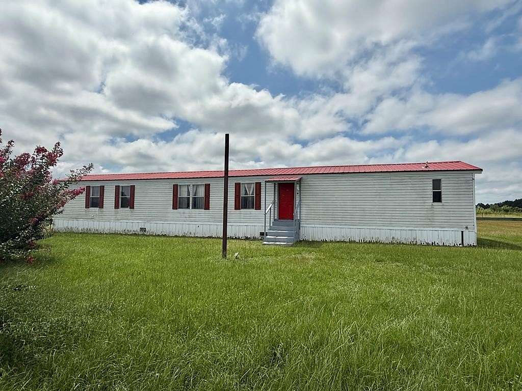 2 Acres of Residential Land with Home for Sale in Sparks, Georgia