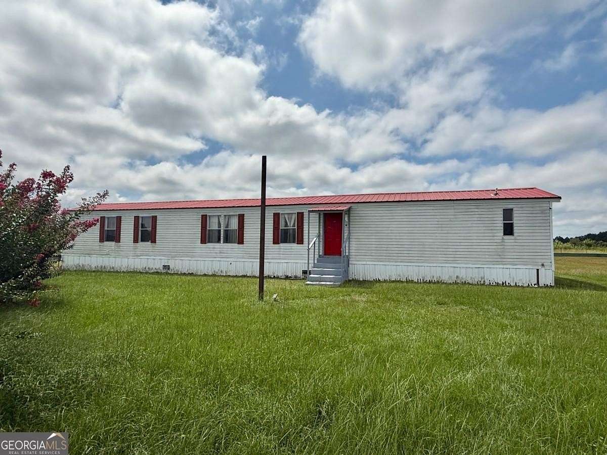 2 Acres of Residential Land with Home for Sale in Sparks, Georgia