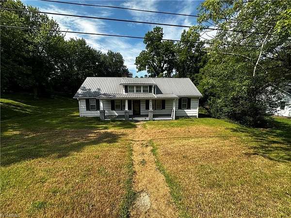 2.68 Acres of Residential Land with Home for Sale in North Wilkesboro, North Carolina