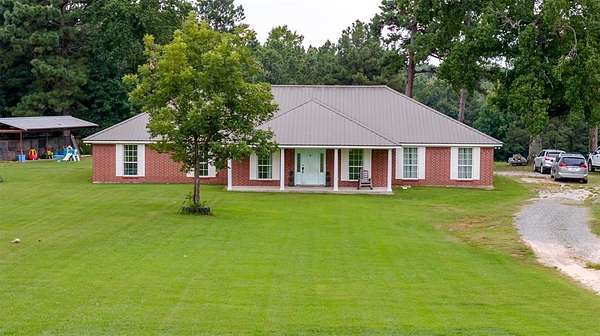 157 Acres of Land with Home for Sale in Annona, Texas