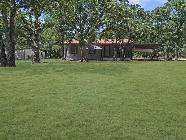 12.2 Acres of Land with Home for Sale in Eastland, Texas