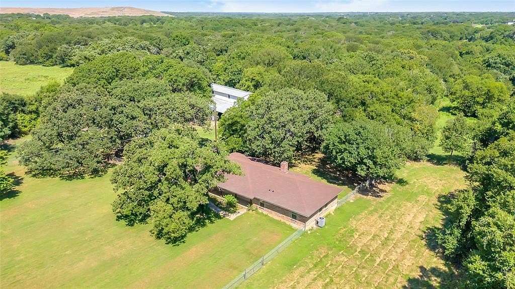 29.5 Acres of Recreational Land with Home for Sale in Grandview, Texas