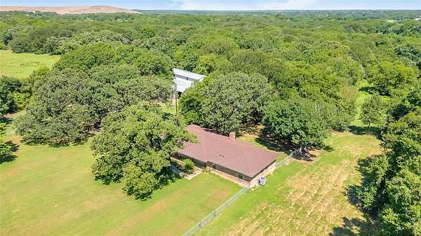 29.5 Acres of Recreational Land with Home for Sale in Grandview, Texas