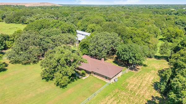 29.5 Acres of Recreational Land with Home for Sale in Grandview, Texas
