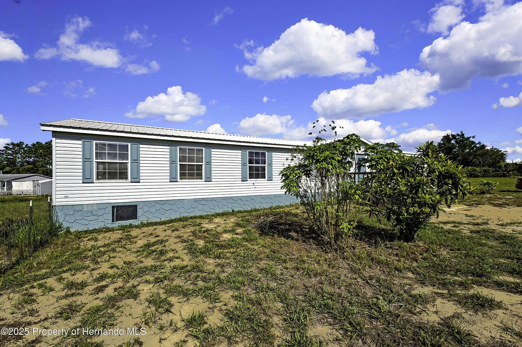 2.5 Acres of Land with Home for Sale in Weeki Wachee, Florida