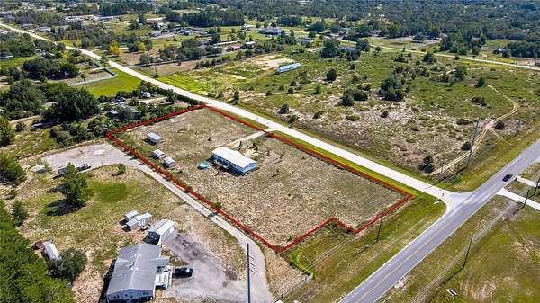 2.5 Acres of Residential Land with Home for Sale in Weeki Wachee, Florida