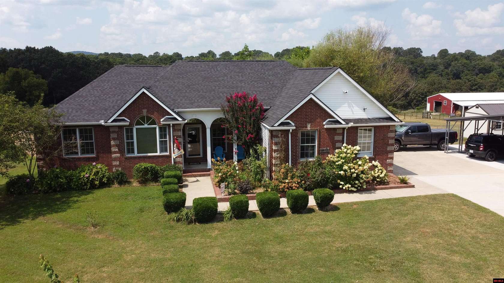 5.25 Acres of Land with Home for Sale in Flippin, Arkansas