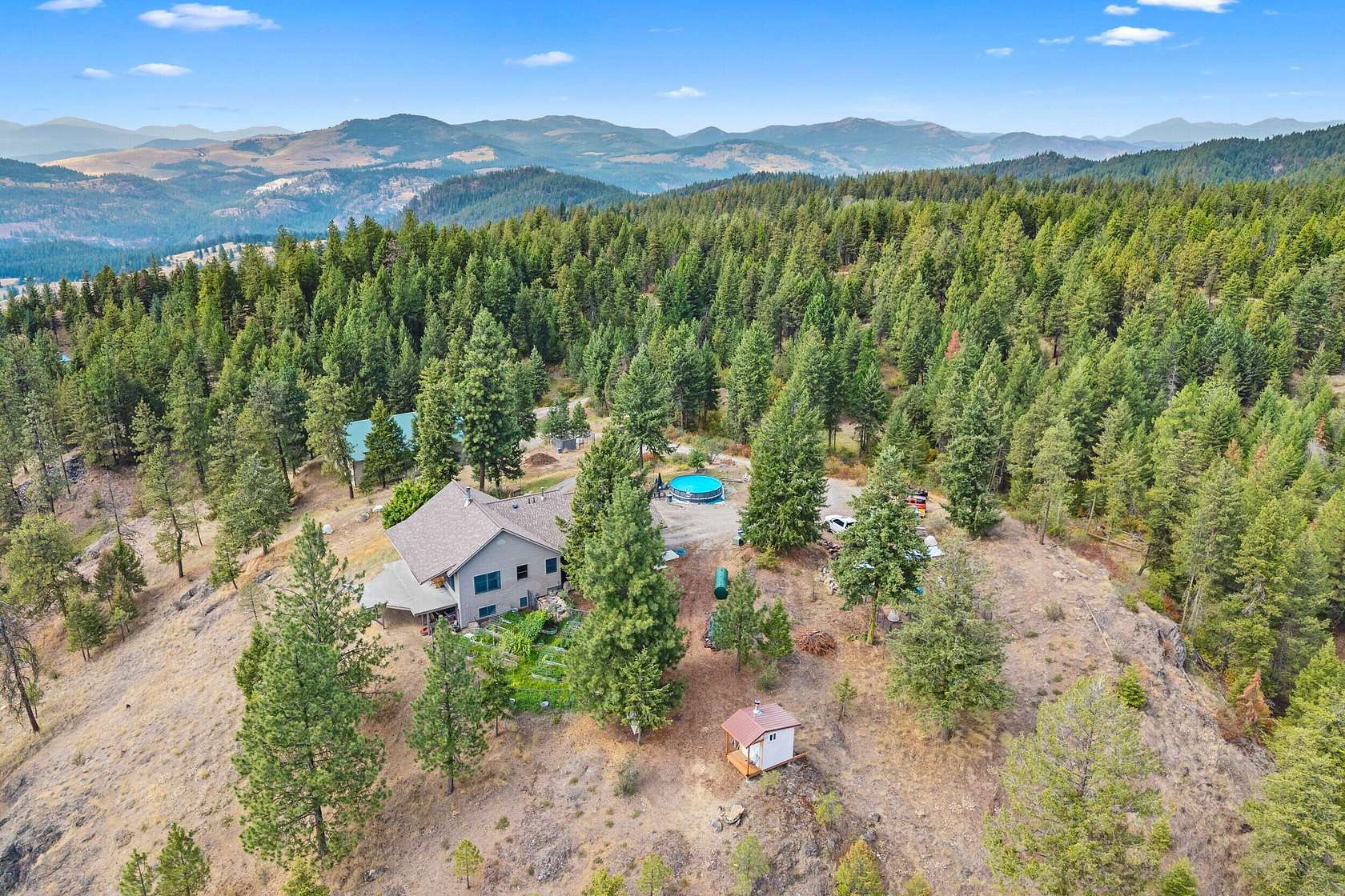40 Acres of Recreational Land with Home for Sale in Evans, Washington