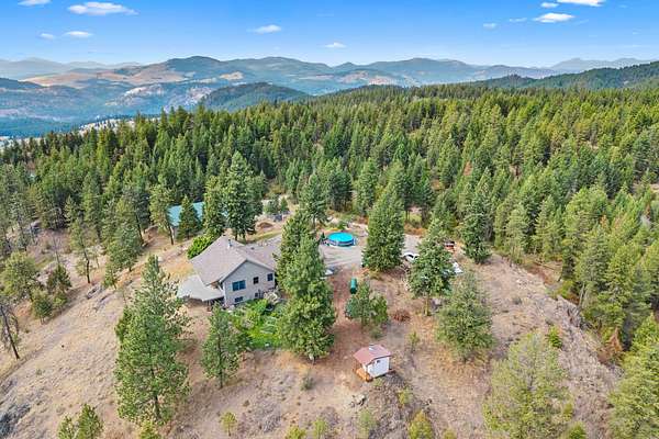40 Acres of Recreational Land with Home for Sale in Evans, Washington