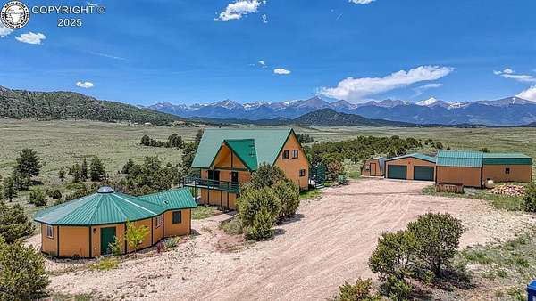 38.3 Acres of Recreational Land with Home for Sale in Cotopaxi, Colorado